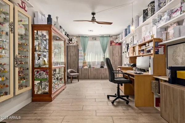 a view of a backyard with a patio and garden
