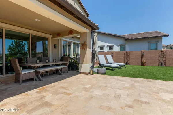 an aerial view of a house with a garden