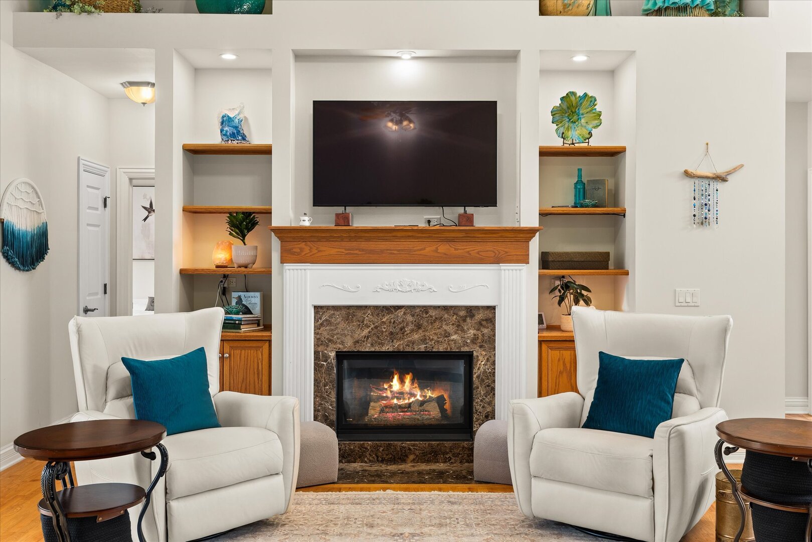 1330 Airport Road Morris, IL 60450 - Photo 25 of 53 a living room with furniture a flat screen tv and a fireplace