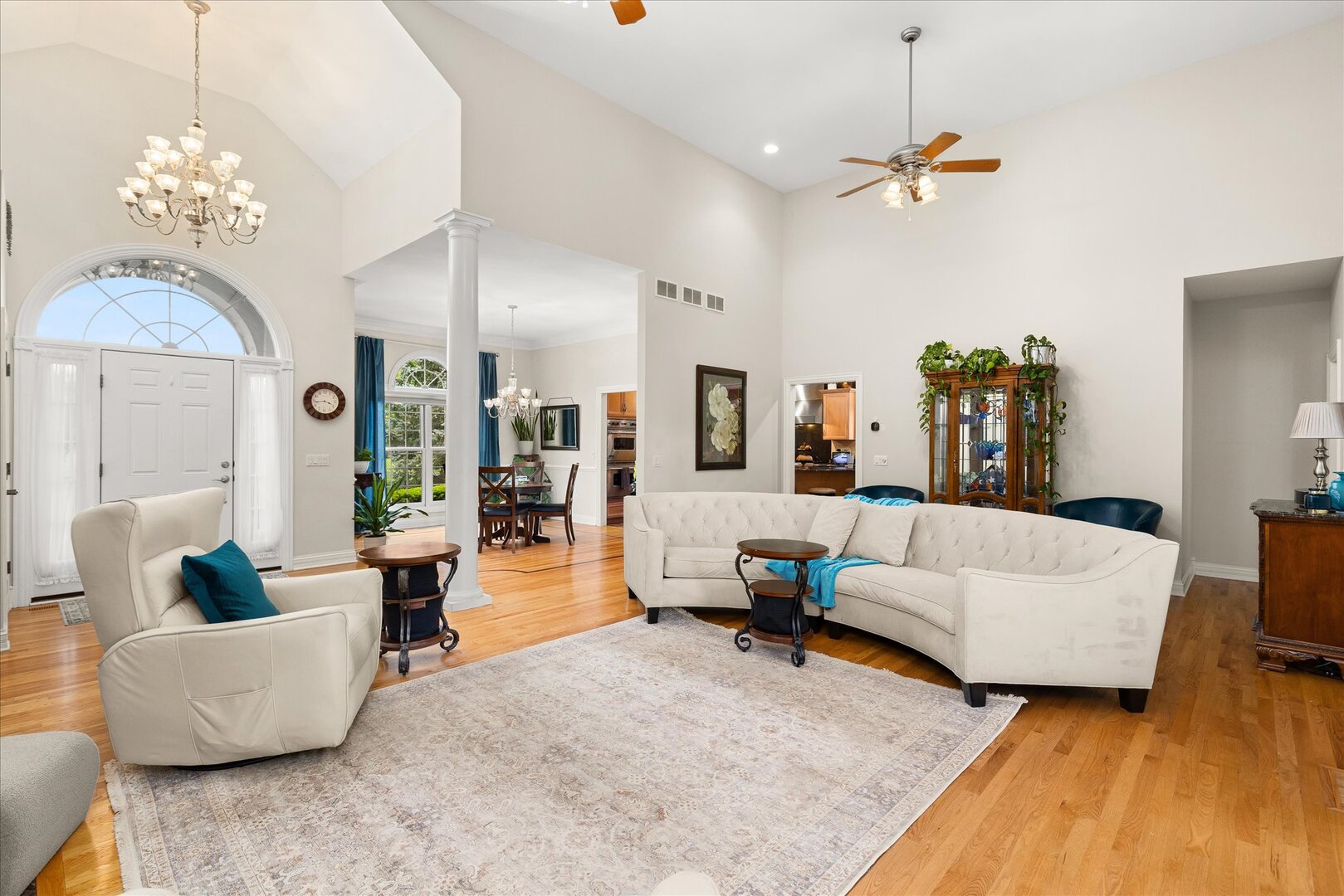1330 Airport Road Morris, IL 60450 - Photo 28 of 53 a living room with furniture and a chandelier