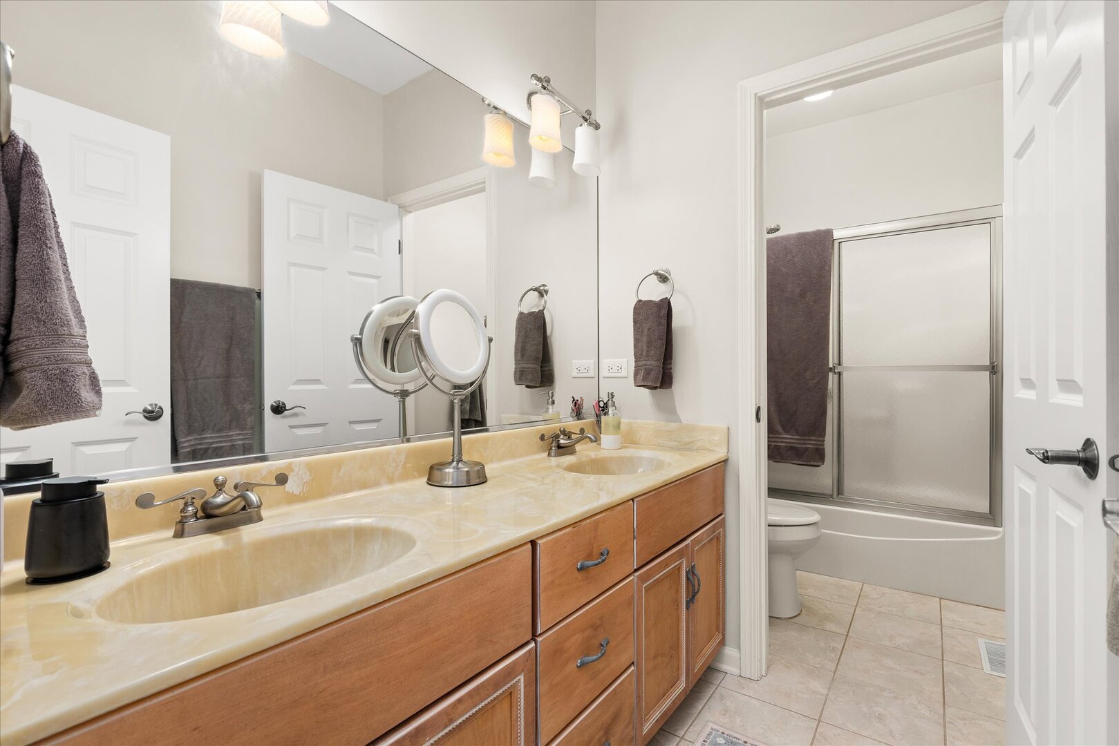 1330 Airport Road Morris, IL 60450 - Photo 31 of 53 a bathroom with a double vanity sink mirror and double