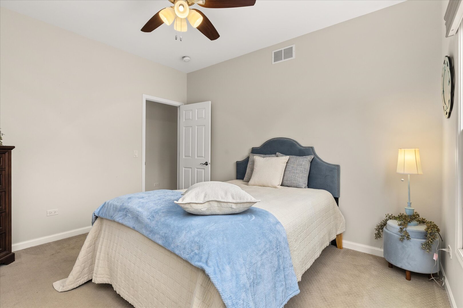 1330 Airport Road Morris, IL 60450 - Photo 33 of 53 a bedroom with a bed and a chandelier
