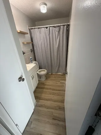 a view of a room with door and stairs