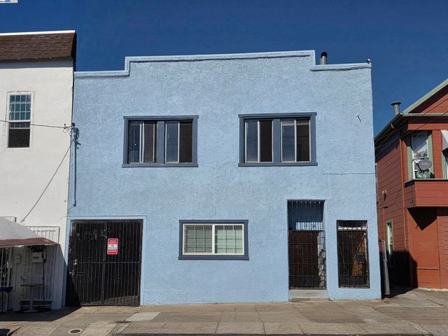 a front view of a building with street
