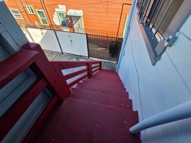 a front view of a house with a stairs