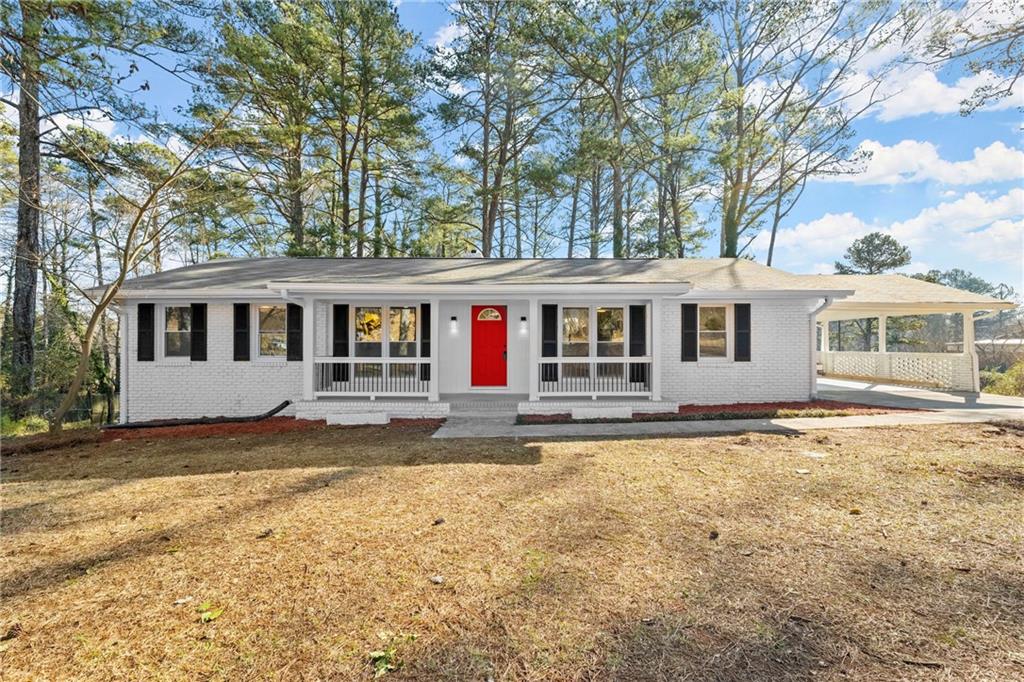2122 Bells Ferry Road Marietta, GA 30066 - Photo 1 of 1 front view of a house with a patio
