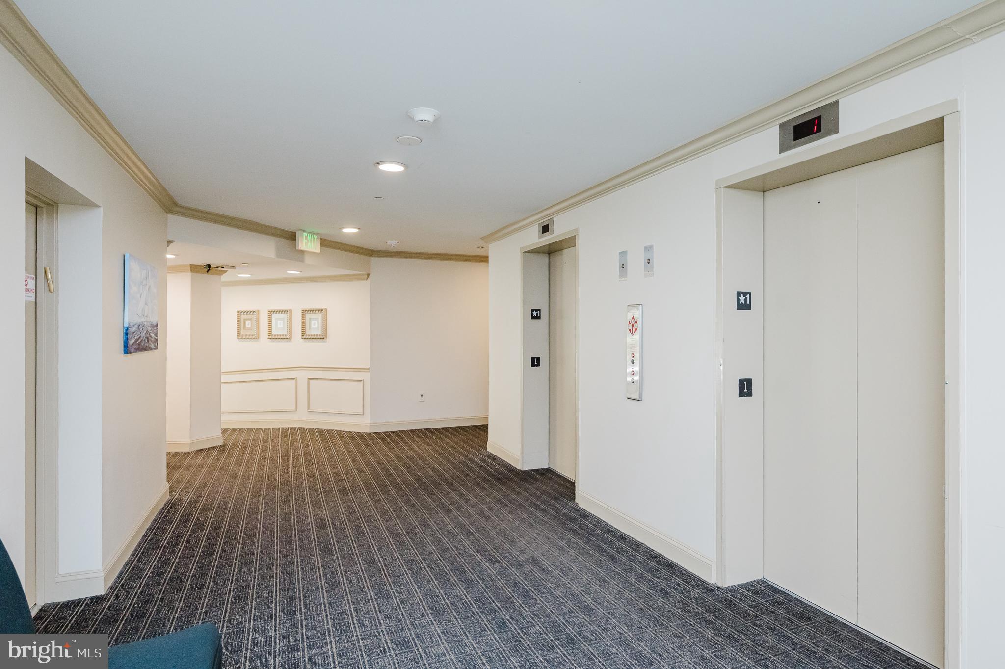3031 Fallstaff Road, Unit 605C Baltimore, MD 21209 - Photo 39 of 42 a view of a hallway with wooden floor and closet