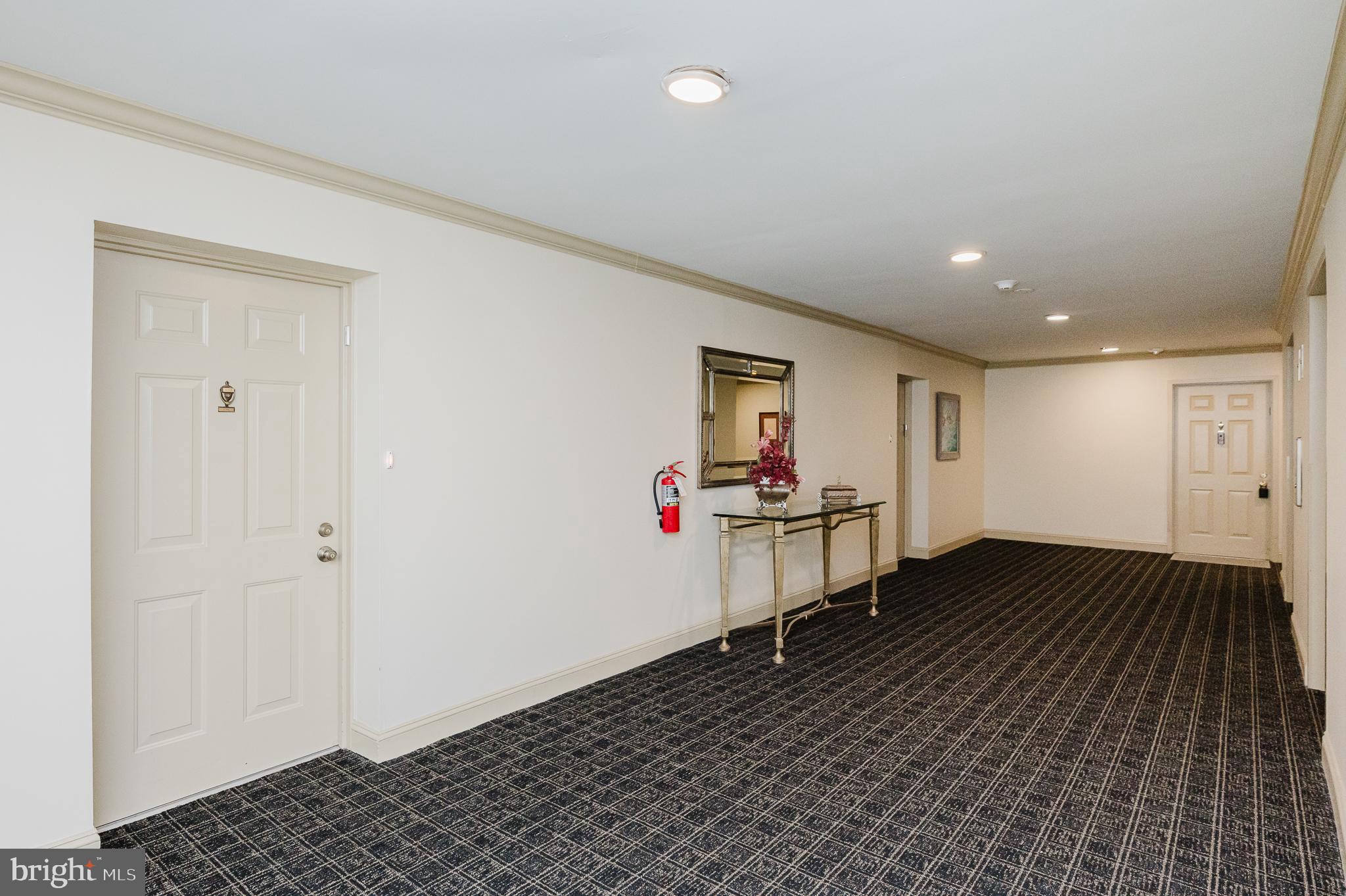 3031 Fallstaff Road, Unit 605C Baltimore, MD 21209 - Photo 40 of 42 a view of a hallway with workspace