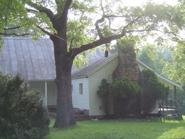 2222 Haw Patch Road Ferrum, VA 24088 - Photo 6 of 6 a backyard of a house with lots of green space