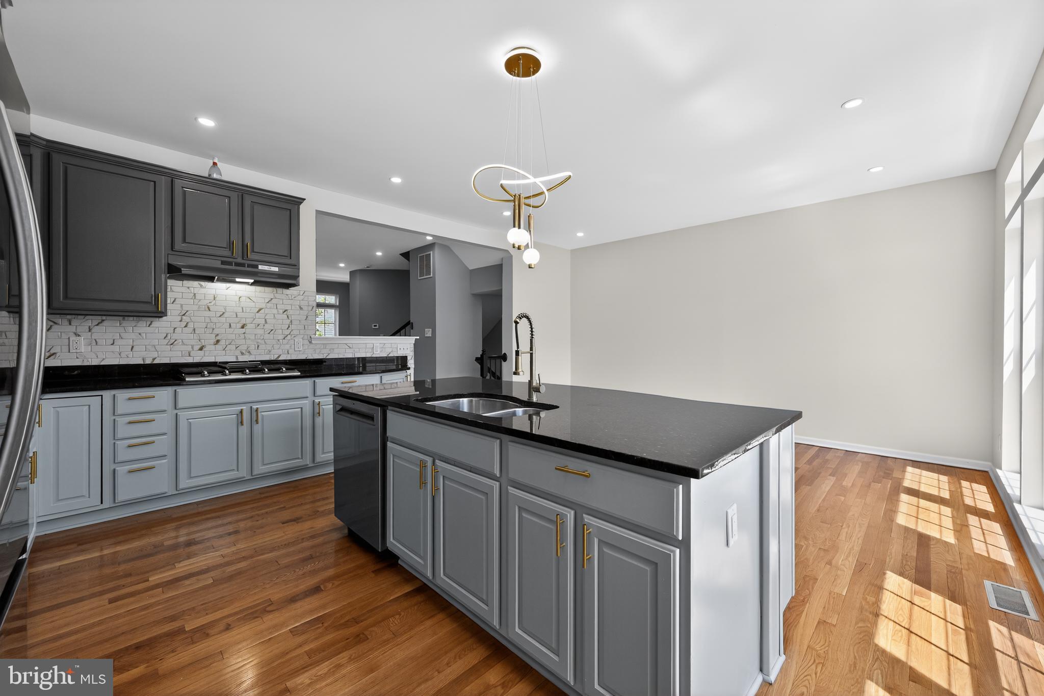 3 Swan Court Delran, NJ 08075 - Photo 13 of 34 a kitchen with stainless steel appliances granite countertop a sink and cabinets