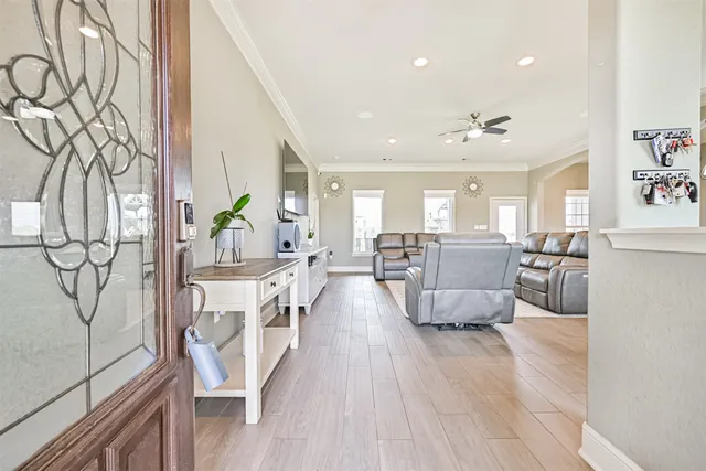 a dining room with a table and chairs