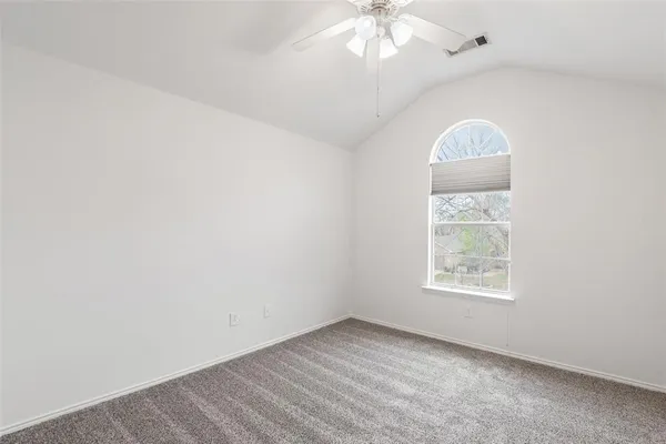 a view of an empty room and closet