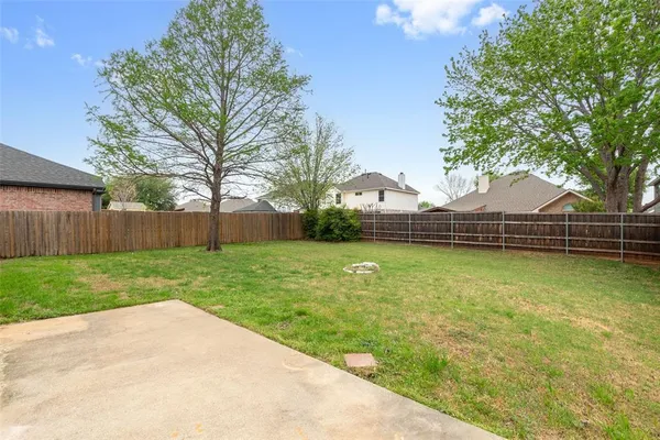a view of a backyard with a garden