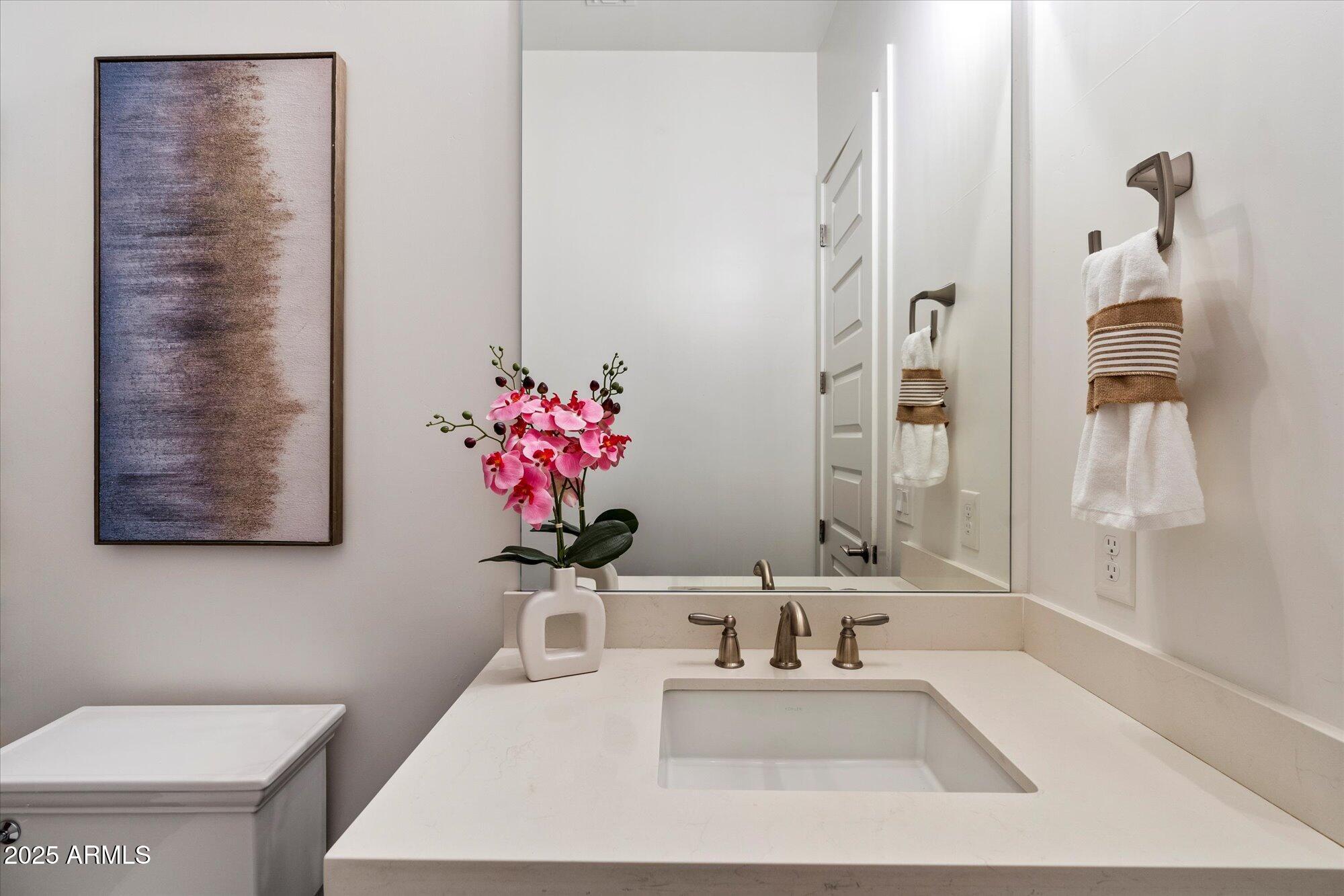 640 West Echo Lane Phoenix, AZ 85021 - Photo 15 of 55 a bathroom with a sink toilet and shower