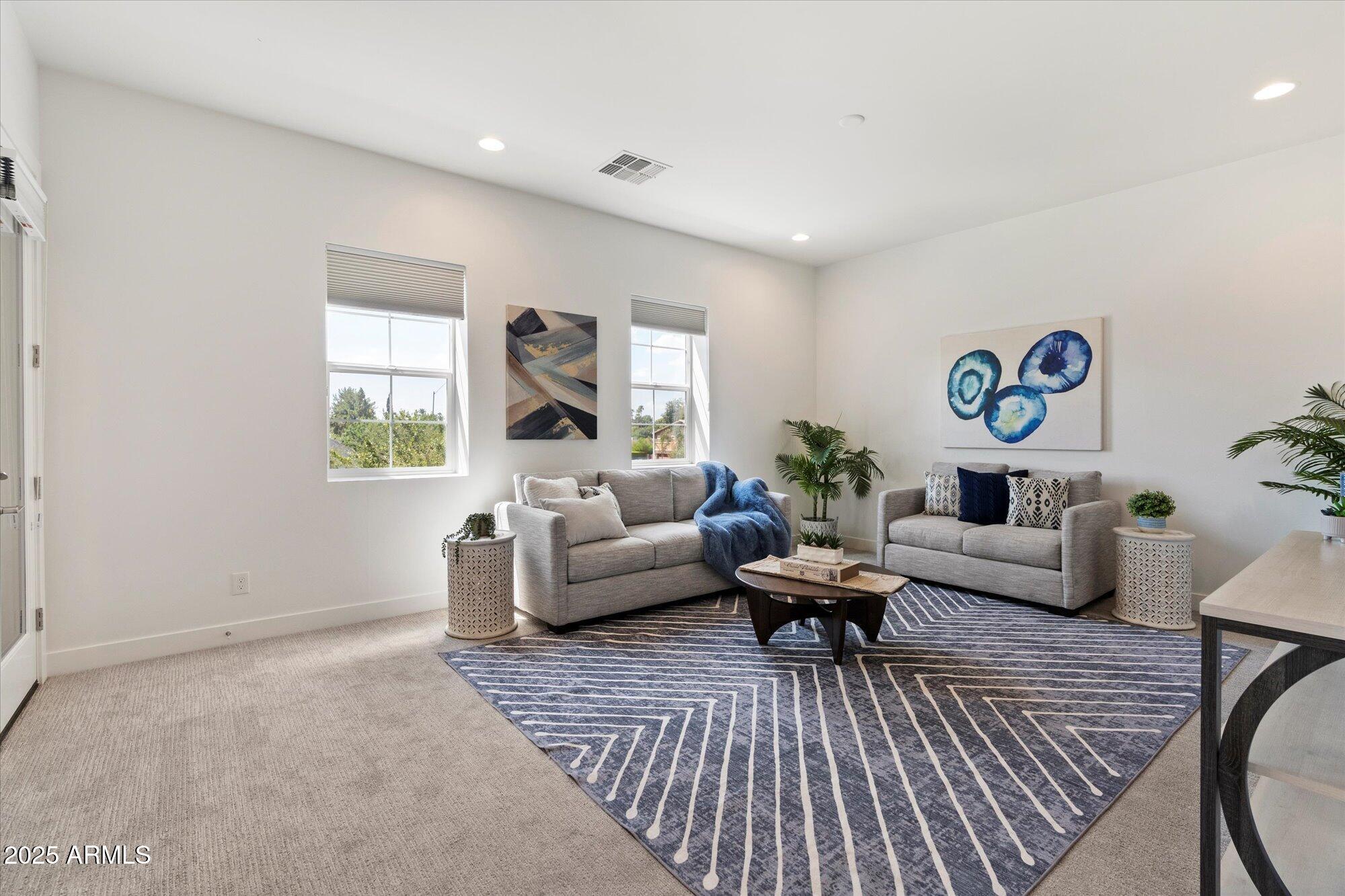 640 West Echo Lane Phoenix, AZ 85021 - Photo 17 of 55 a living room with furniture and a rug