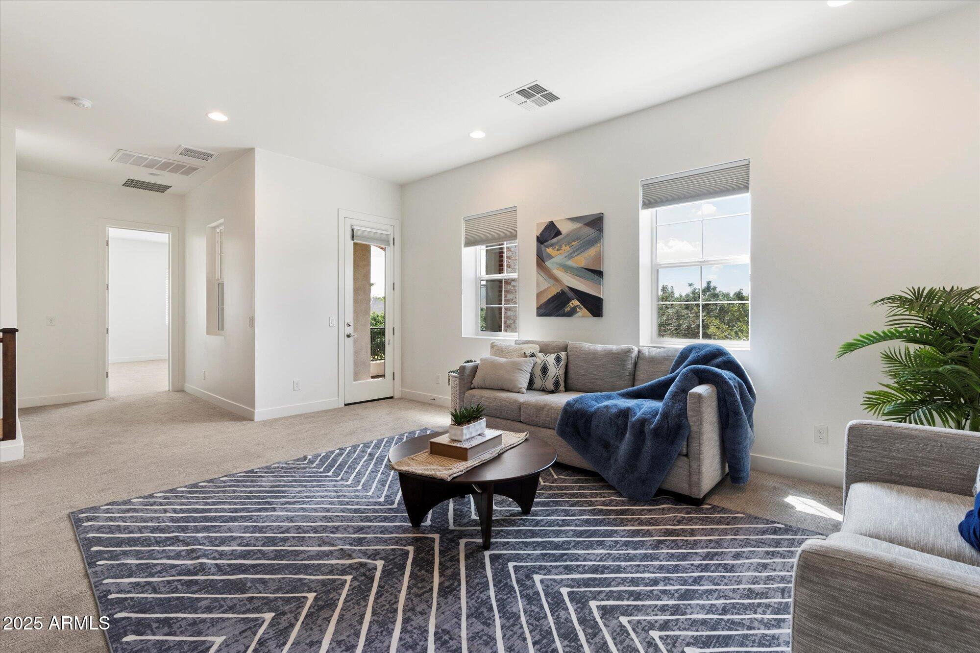640 West Echo Lane Phoenix, AZ 85021 - Photo 18 of 55 a living room with furniture and a rug