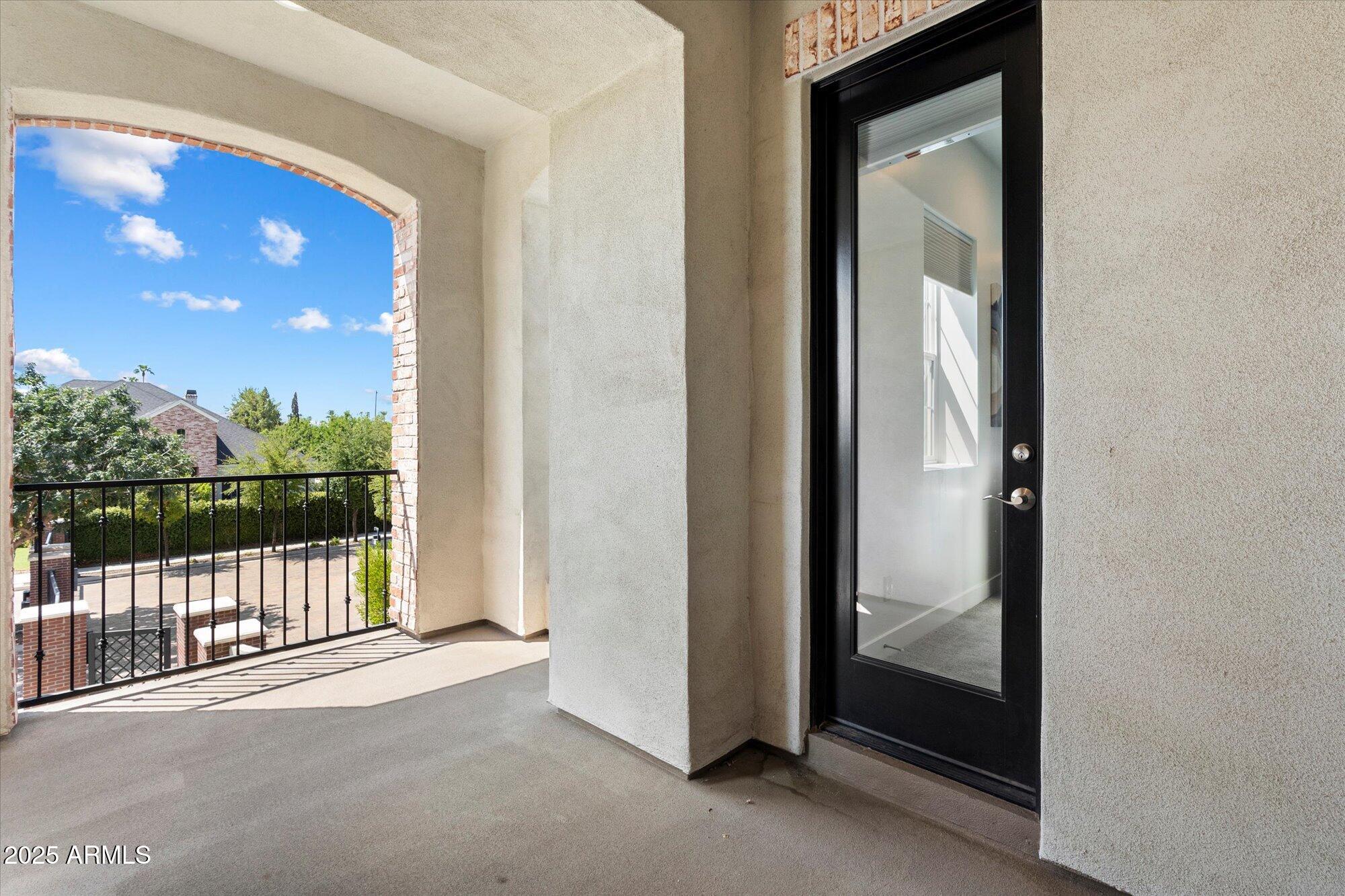 640 West Echo Lane Phoenix, AZ 85021 - Photo 19 of 55 a view of a glass door with a balcony