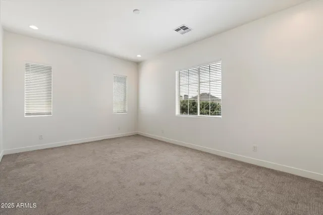 a bathroom with a sink vanity and a mirror