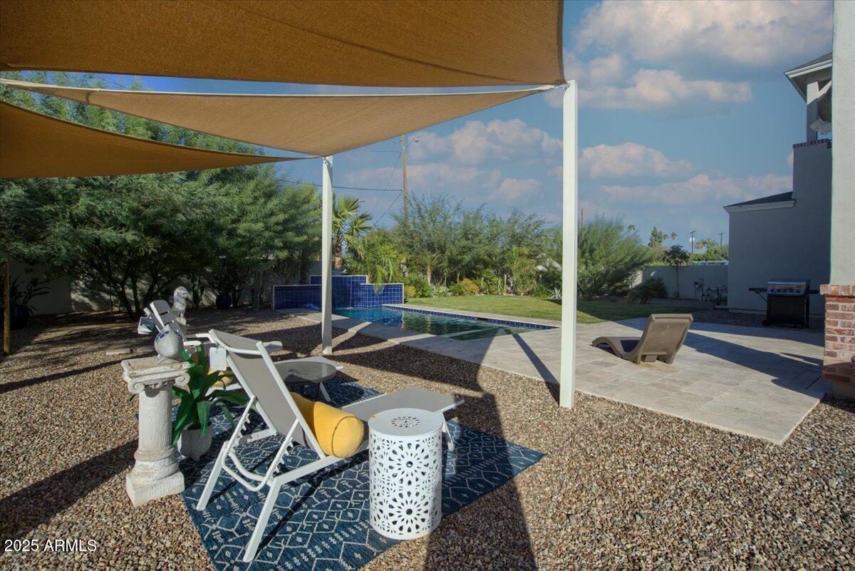 640 West Echo Lane Phoenix, AZ 85021 - Photo 43 of 55 a view of a swimming pool with a patio