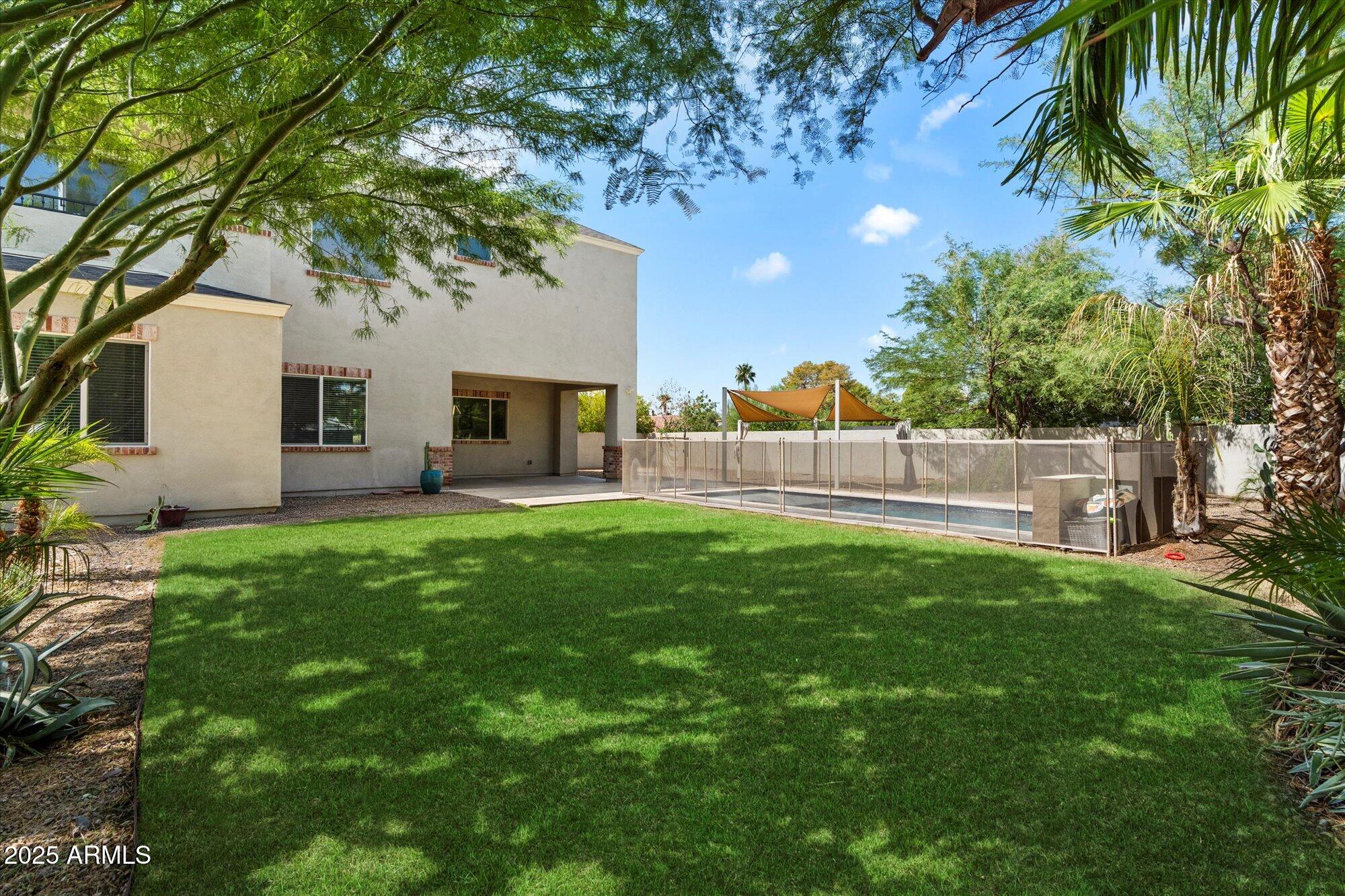 640 West Echo Lane Phoenix, AZ 85021 - Photo 49 of 55 a view of a house with backyard and a tree