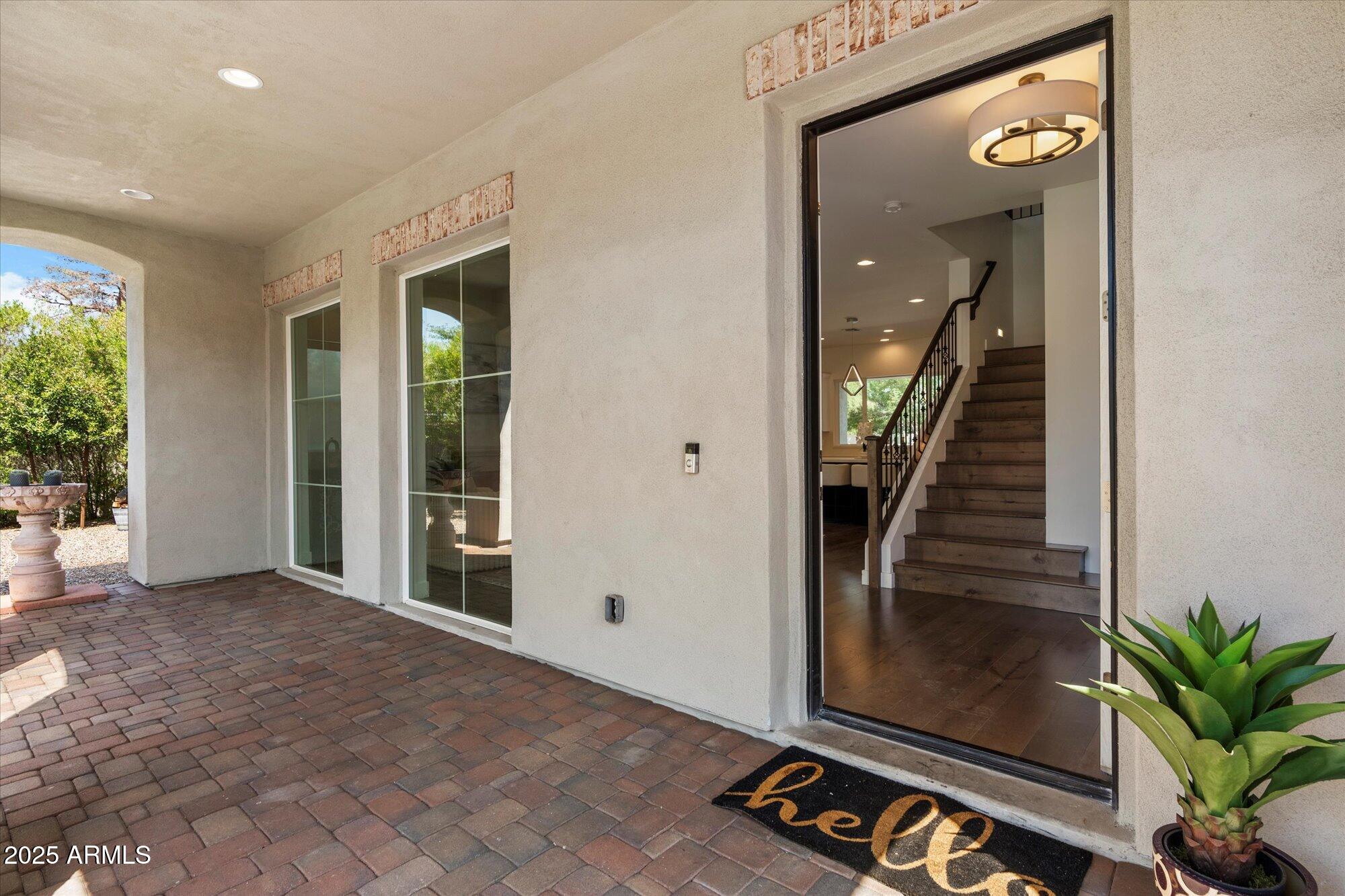 640 West Echo Lane Phoenix, AZ 85021 - Photo 6 of 55 a view of a hallway with wooden floor and staircase