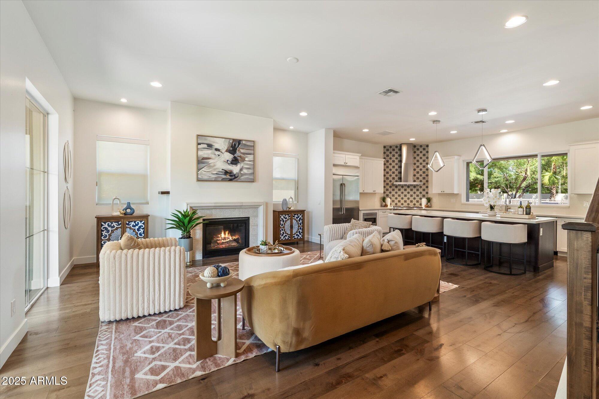 640 West Echo Lane Phoenix, AZ 85021 - Photo 8 of 55 a living room with fireplace furniture and a fireplace