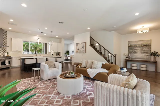 a living room with furniture and a table