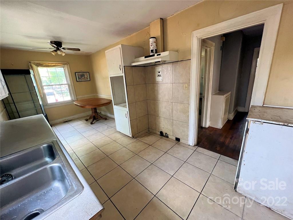 1322 Shamrock Drive Charlotte, NC 28205 - Photo 19 of 21 a view of a livingroom with furniture and a window