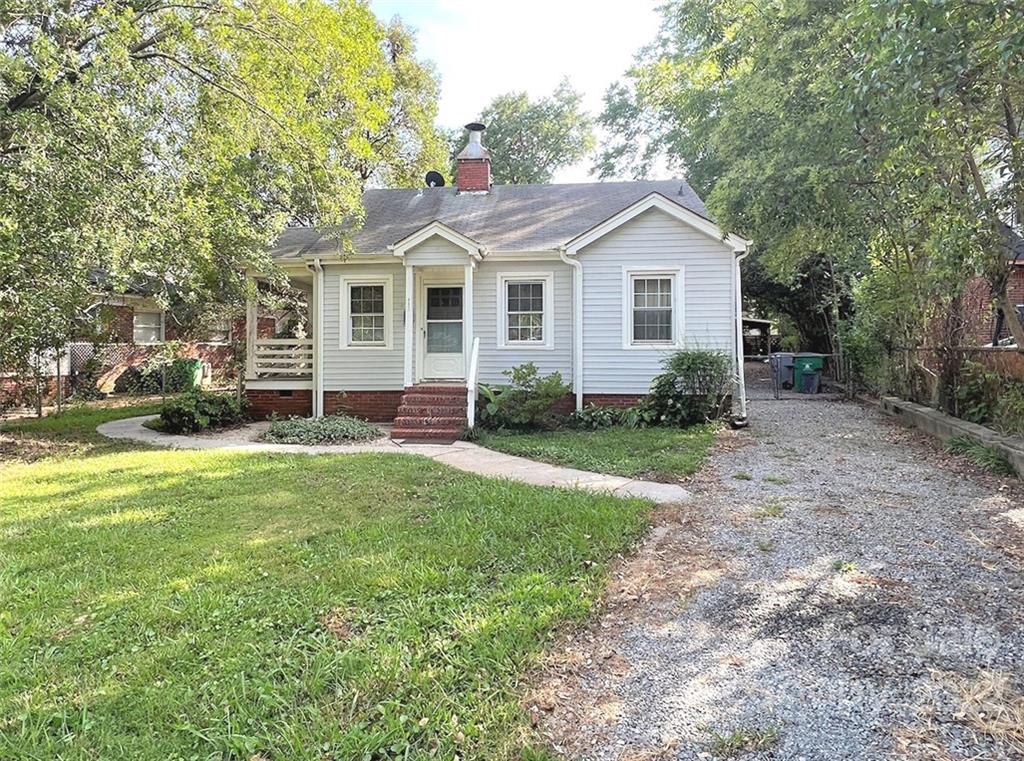 1322 Shamrock Drive Charlotte, NC 28205 - Photo 6 of 21 a front view of a house with garden
