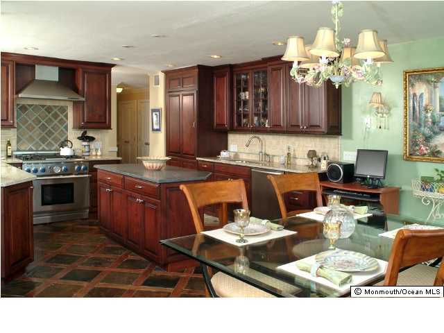 28 Riverside Avenue, Unit 12A Red Bank, NJ 07701 - Photo 3 of 3 a kitchen with a sink and cabinets