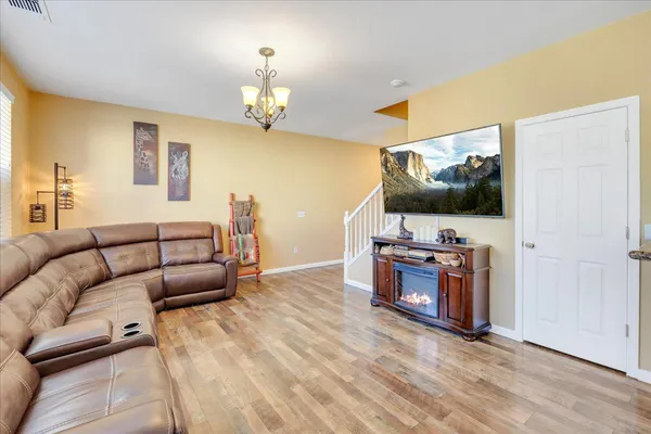 a bathroom with a double vanity sink mirror and shower