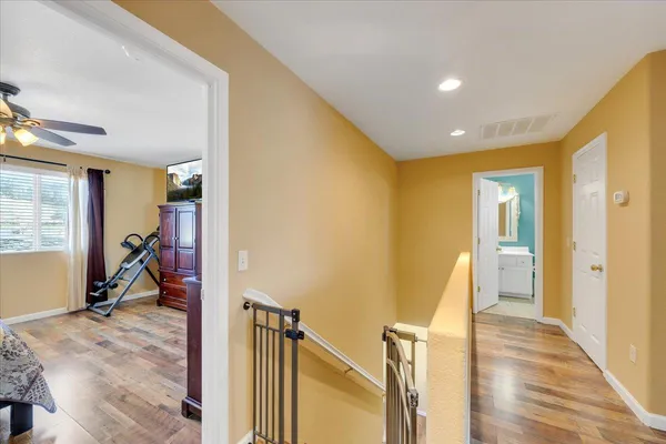 a bathroom with a double vanity sink mirror and shower