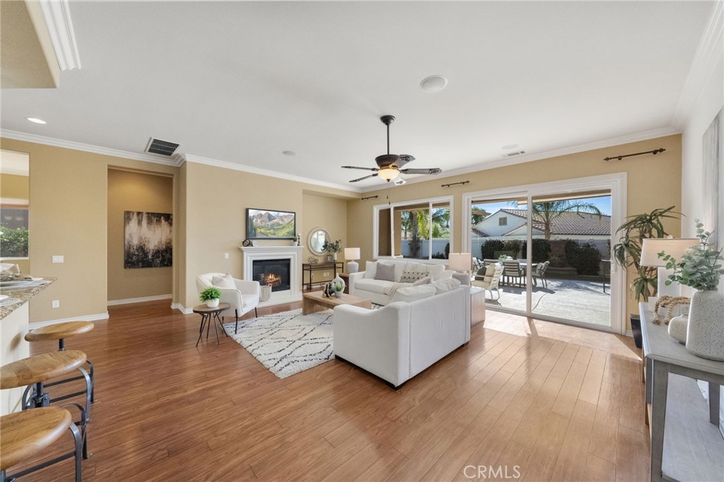 1669 Via Simpatico Hemet, CA 92545 - Photo 19 of 58 Family room with fireplace