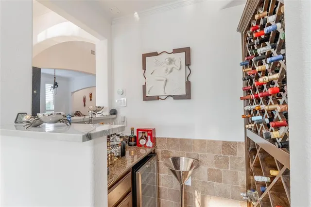 a bathroom with a sink mirror and vanity
