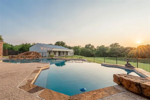 a view of a lake with couches