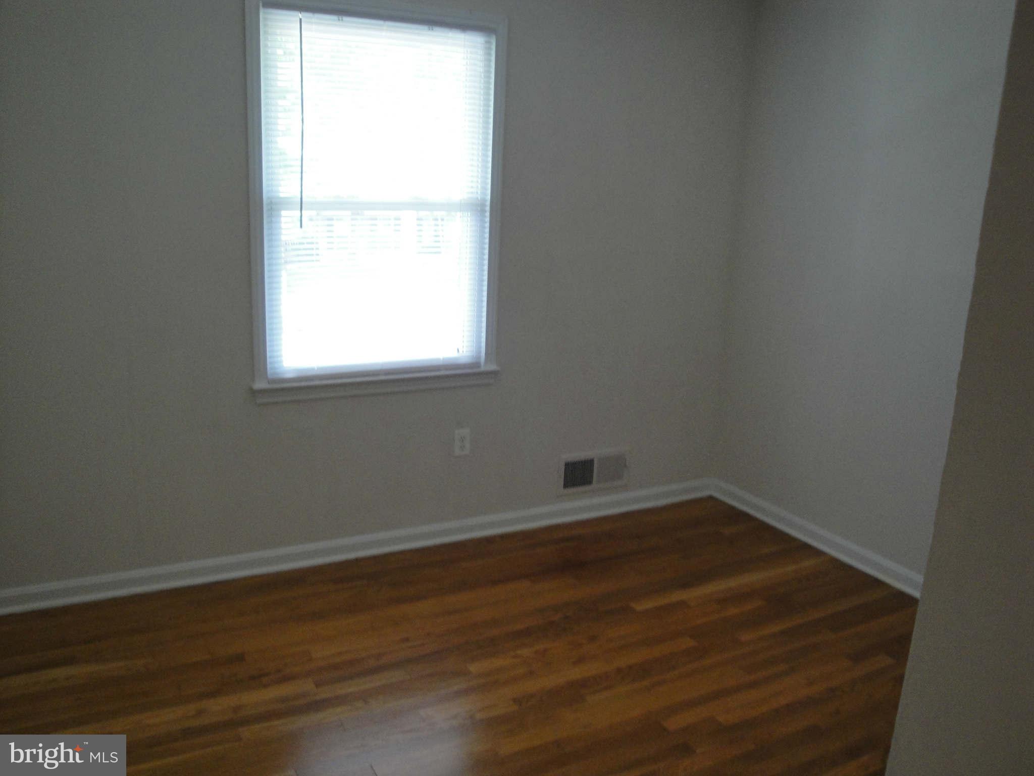 13212 Tamarack Road Silver Spring, MD 20904 - Photo 14 of 28 an empty room with a window