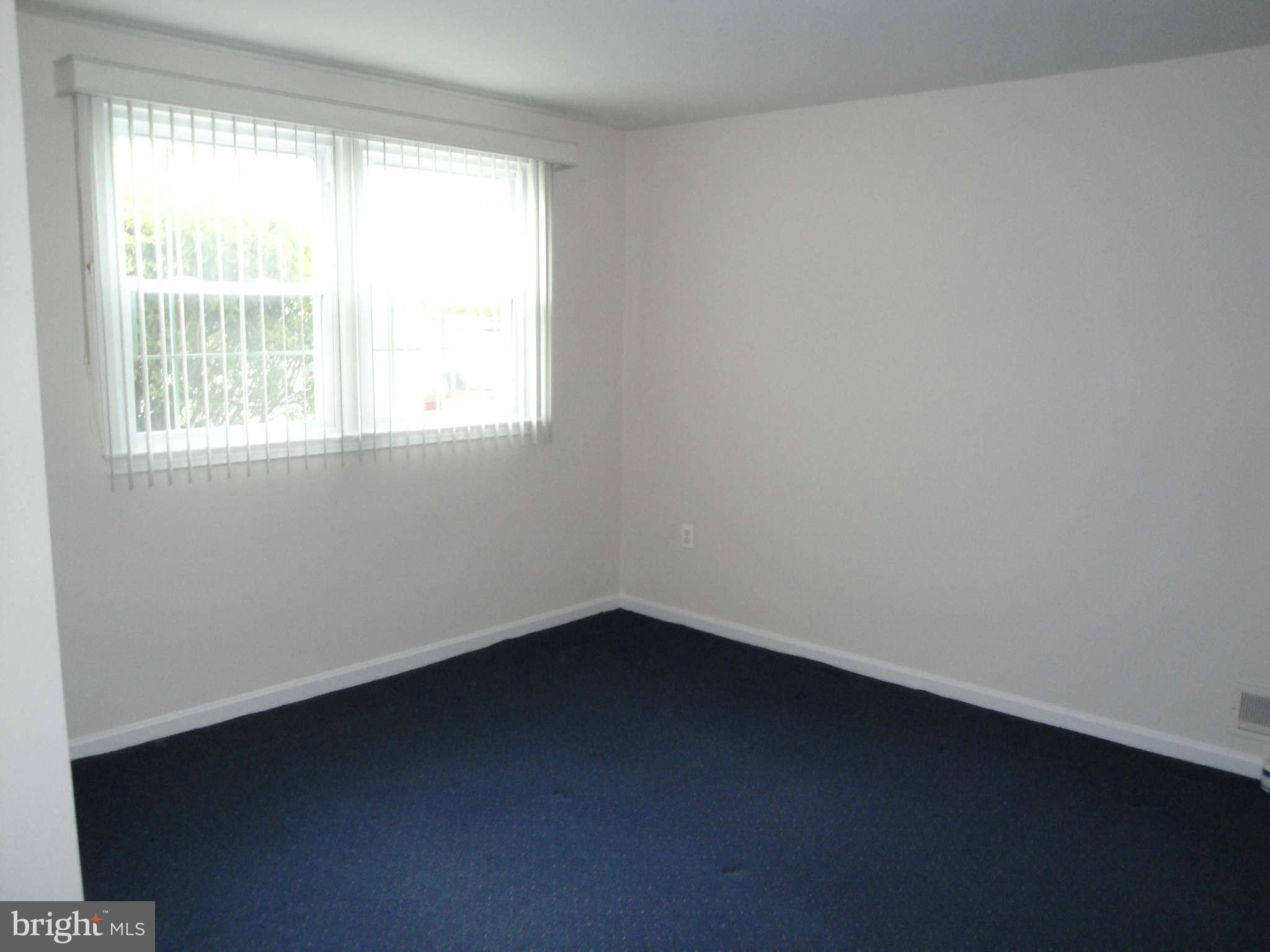 13212 Tamarack Road Silver Spring, MD 20904 - Photo 18 of 28 an empty room with a window