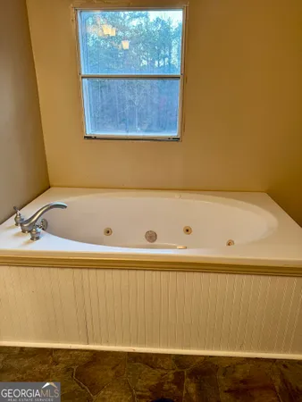 a bathroom with a tub