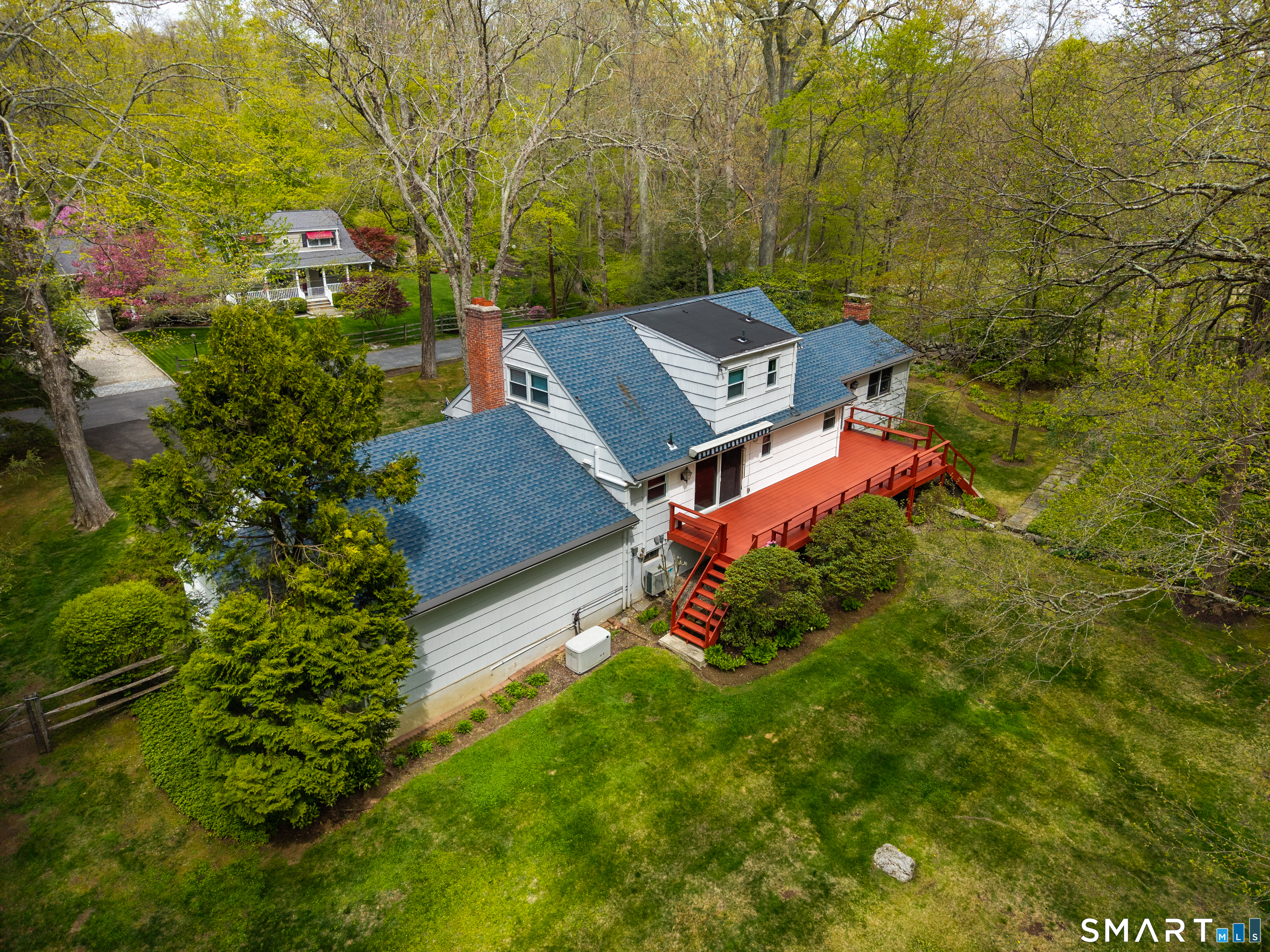 15 Limestone Terrace Ridgefield, CT 06877 - Photo 4 of 32 an aerial view of a house with a yard