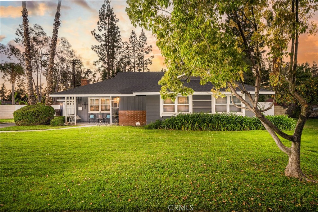 5721 Durango Road Riverside, CA 92506 - Photo 1 of 1 a front view of a house with a garden