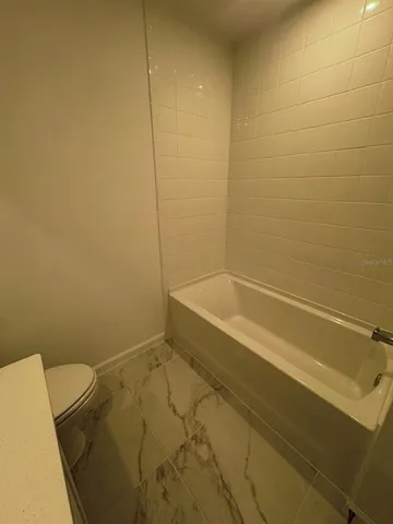 a bathroom with a bathtub