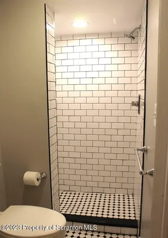 a bathroom with a toilet