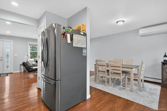 a view of a kitchen and dining room