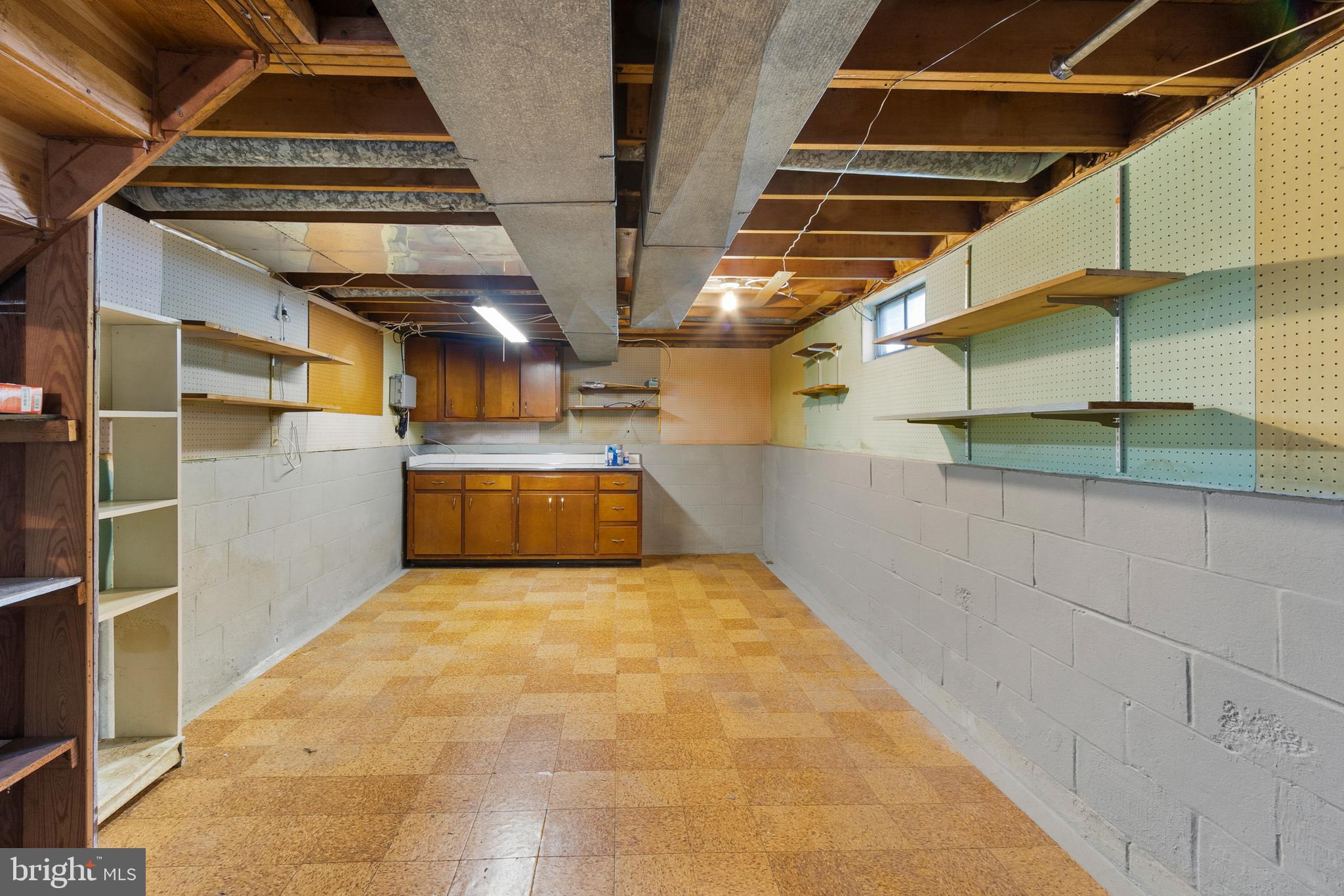 402 Blackstone Road Newark, DE 19713 - Photo 18 of 29 a view of a garage of wooden table