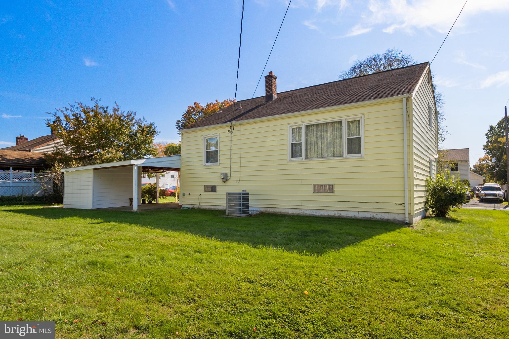 402 Blackstone Road Newark, DE 19713 - Photo 22 of 29 a front view of house with yard and trees in the background