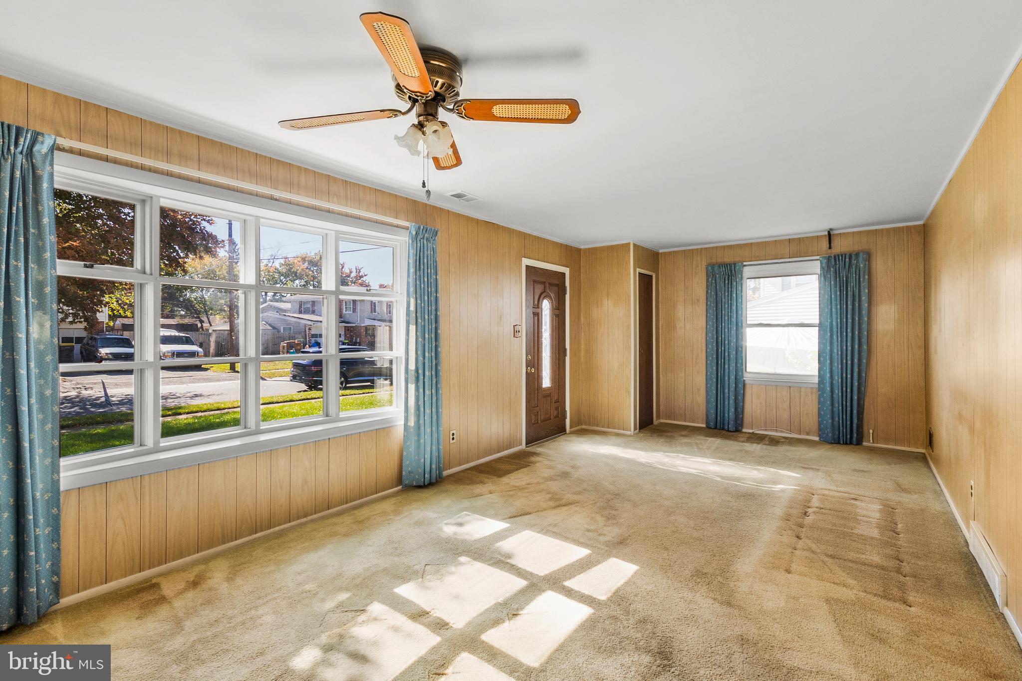 402 Blackstone Road Newark, DE 19713 - Photo 4 of 29 a view of an empty room with a window