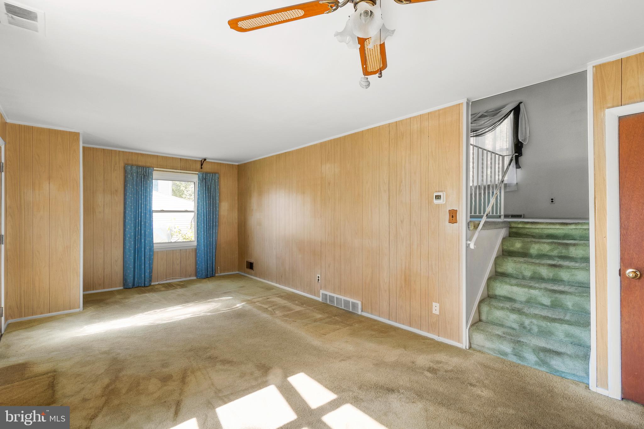 402 Blackstone Road Newark, DE 19713 - Photo 5 of 29 a view of a big room with closet and windows