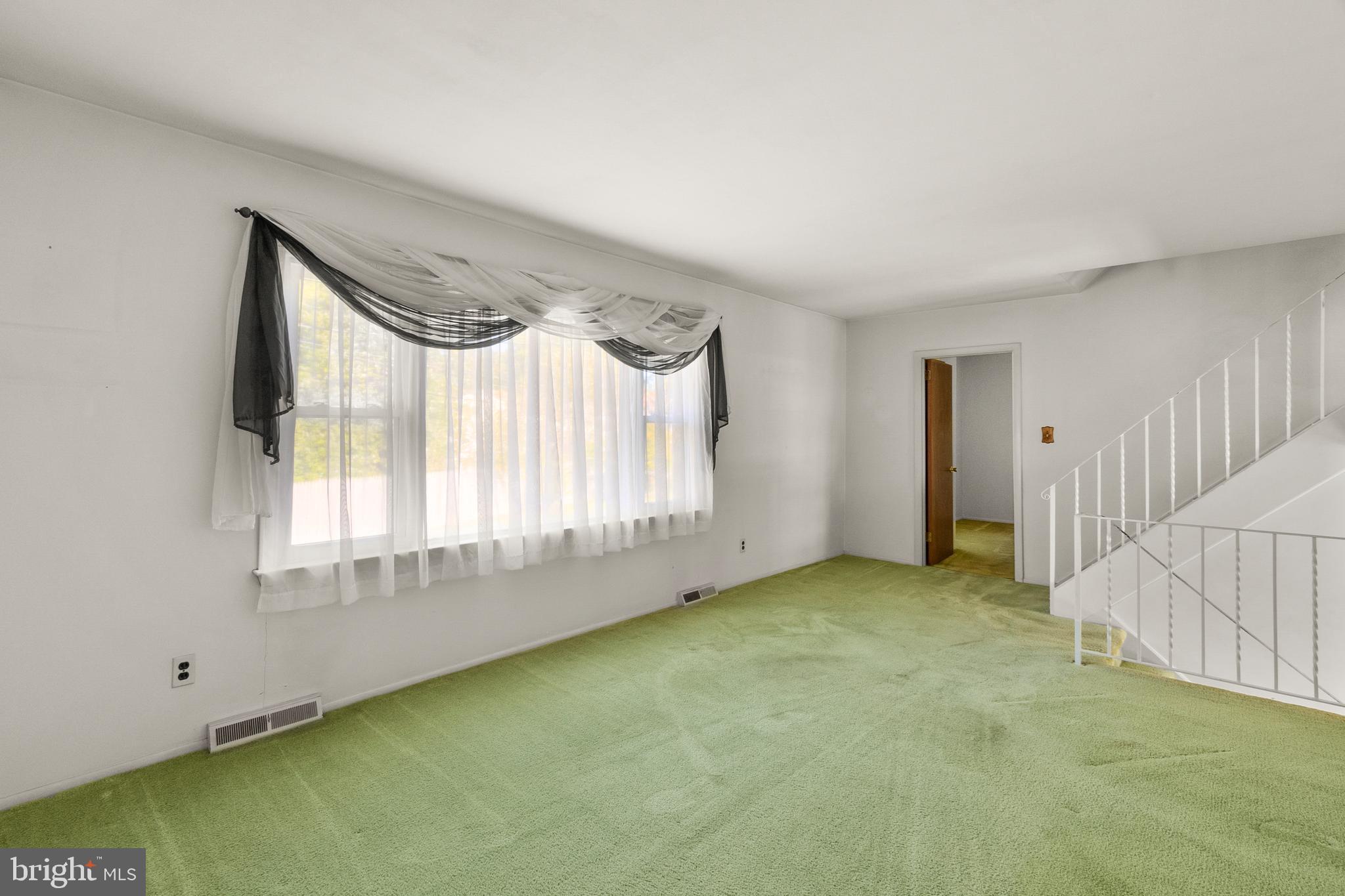 402 Blackstone Road Newark, DE 19713 - Photo 10 of 29 a view of an empty room with a window