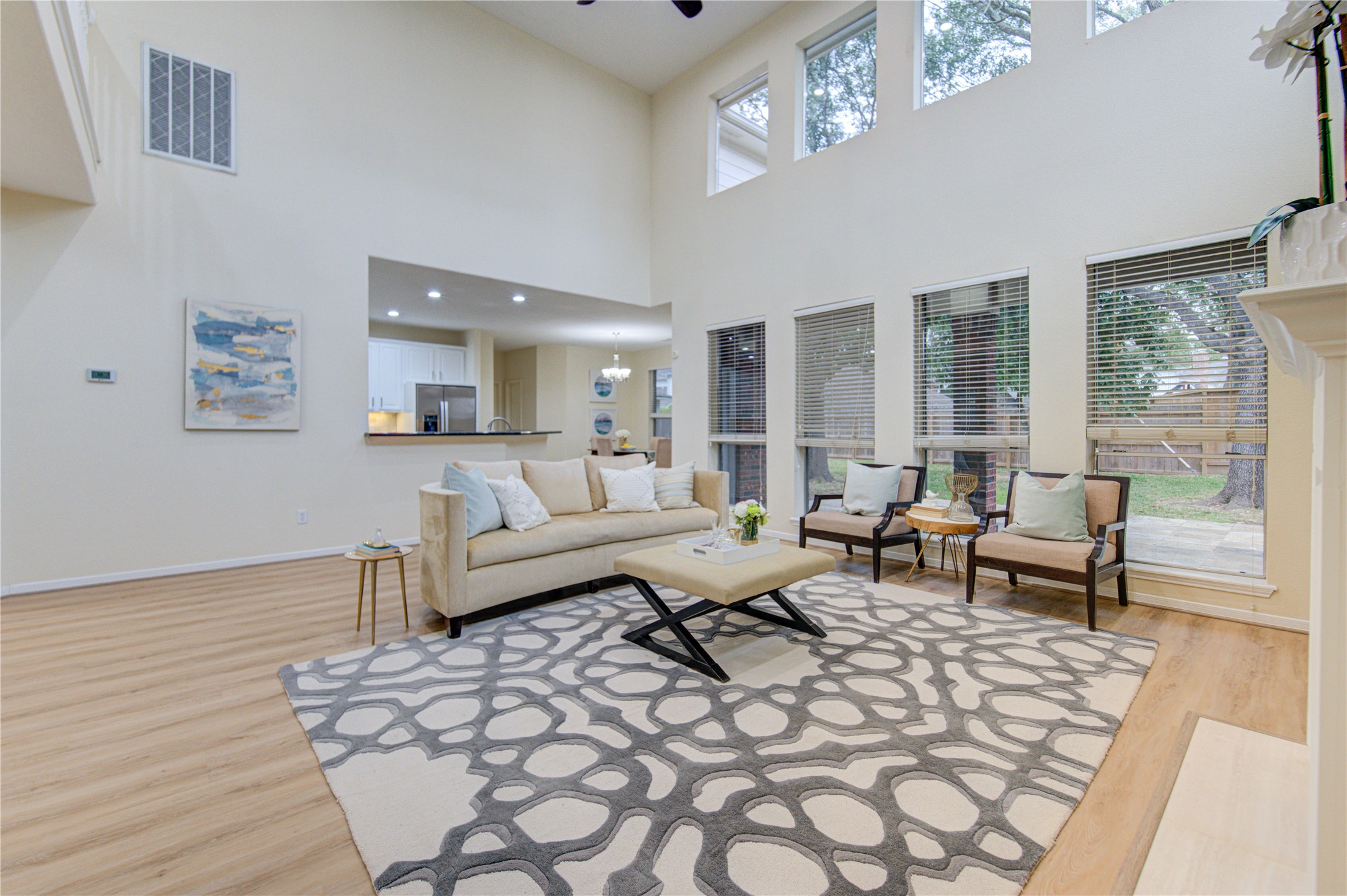2327 Centerbrook Lane Katy, TX 77450 - Photo 22 of 47 a living room with furniture and a large window