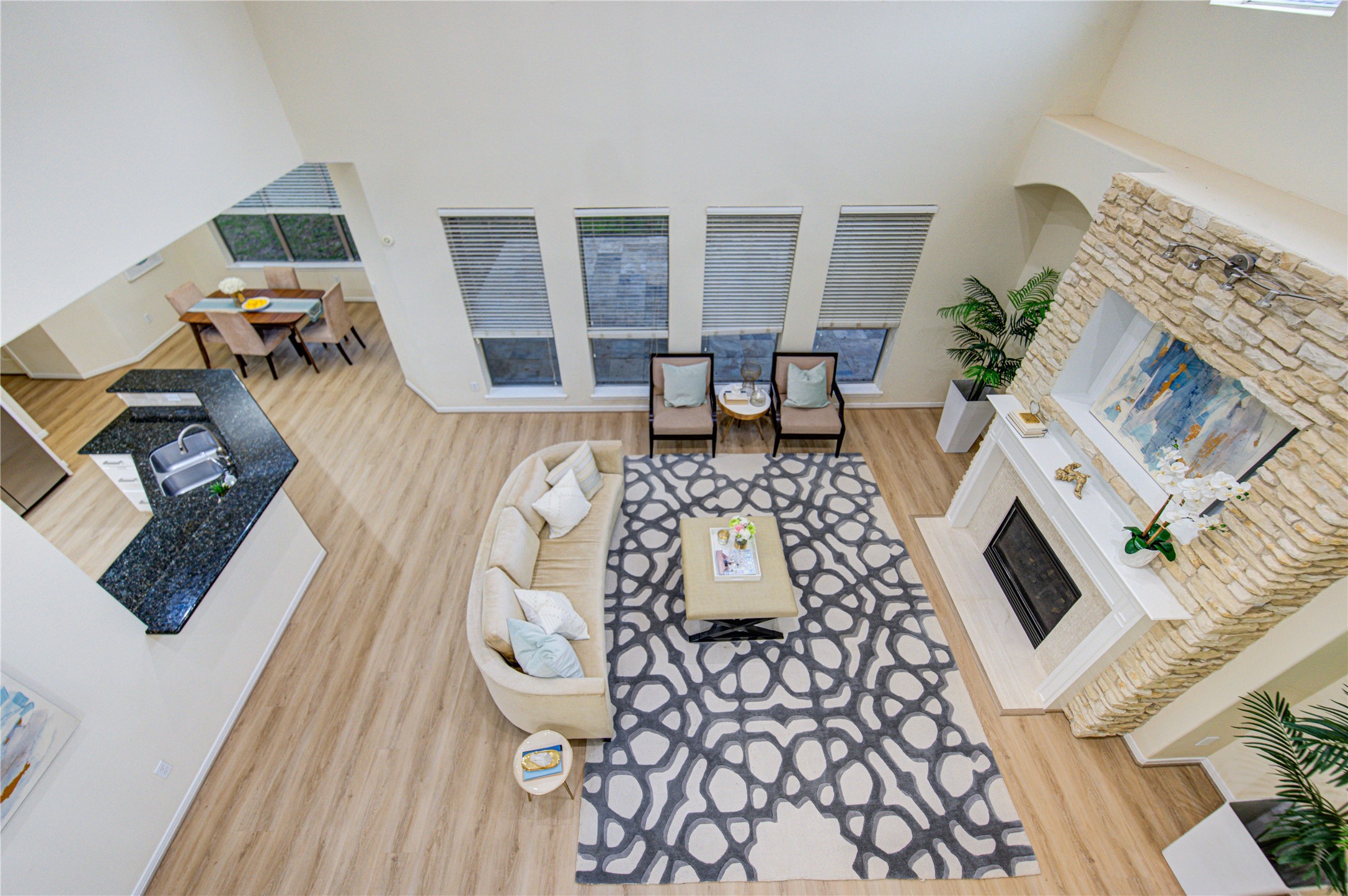 2327 Centerbrook Lane Katy, TX 77450 - Photo 28 of 47 a living room with furniture a rug and a fireplace